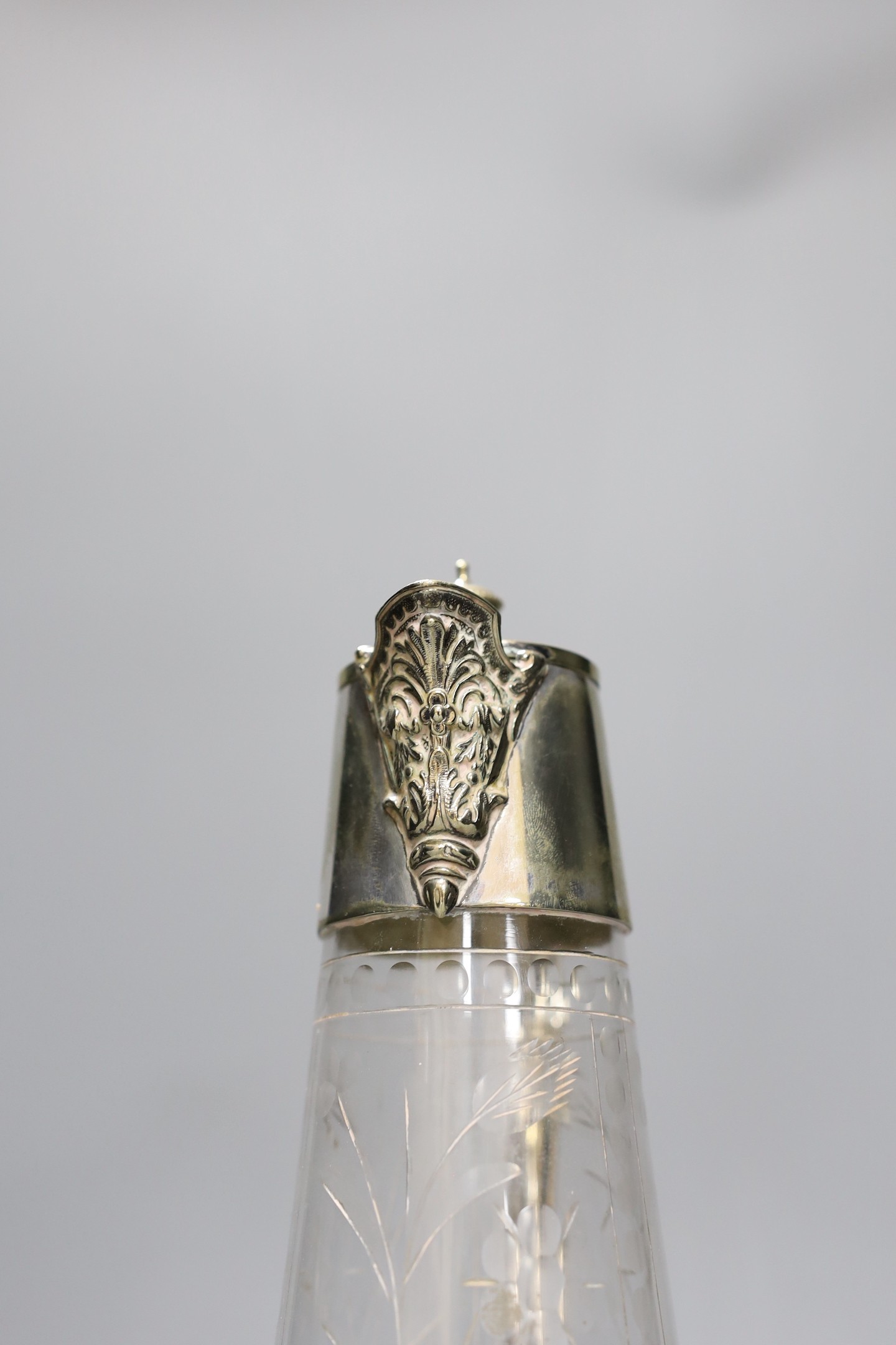 An electroplate mounted cut glass claret jug, 30cm